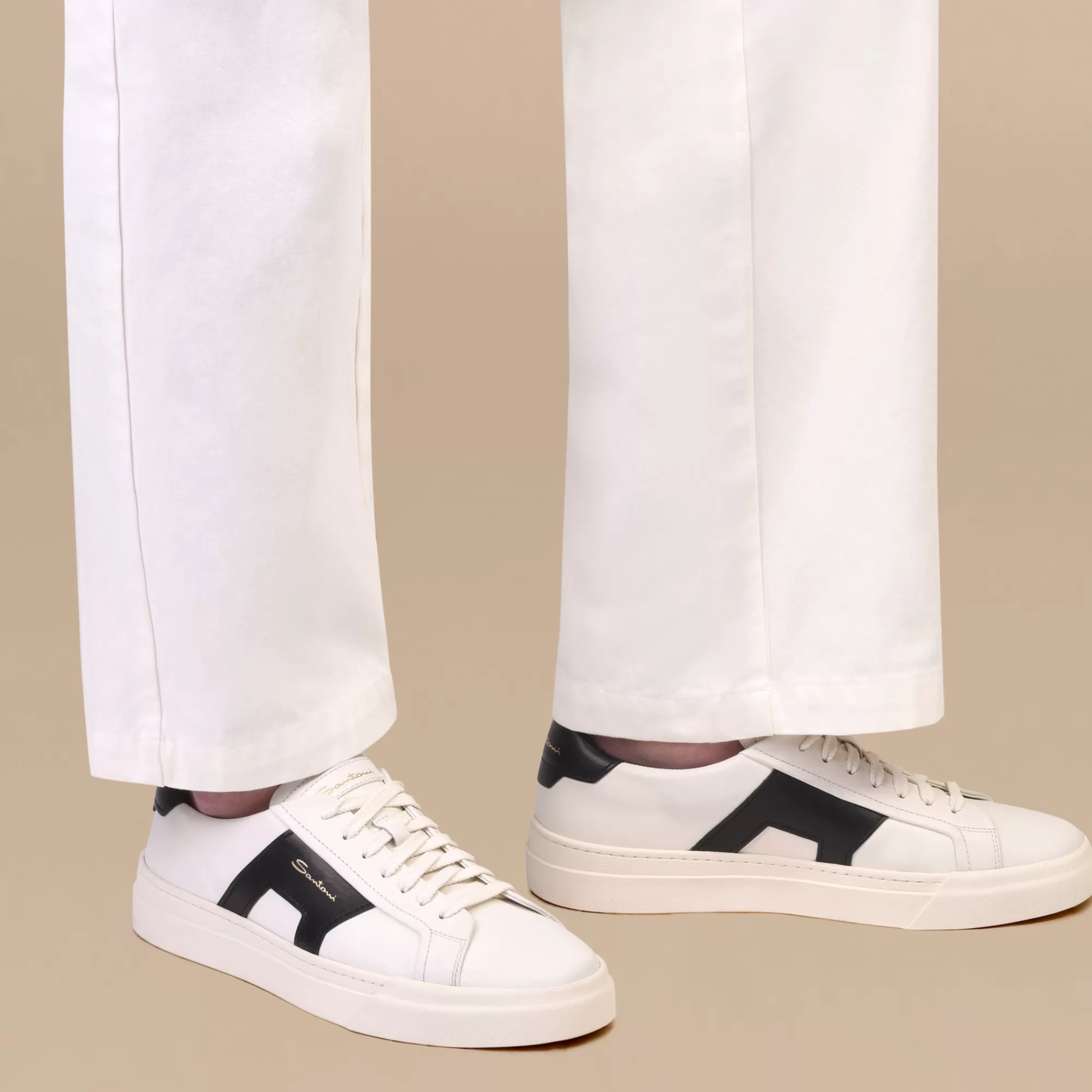 Clearance Double buckle sneaker da uomo in pelle bianca e nera Vedi tutte le calzature | Sneakers
